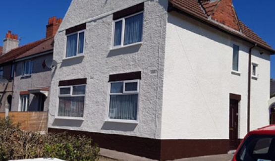 After wall protective coating on house